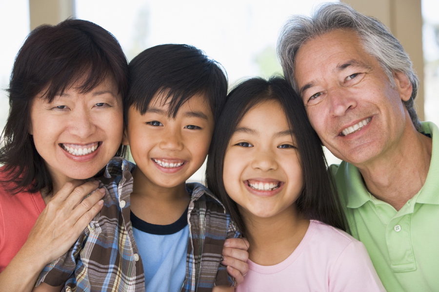 Grandparents posing with grandchildren